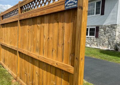 Wooden fence with lattice top