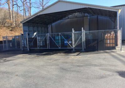 Covered storage area with chain-link fence